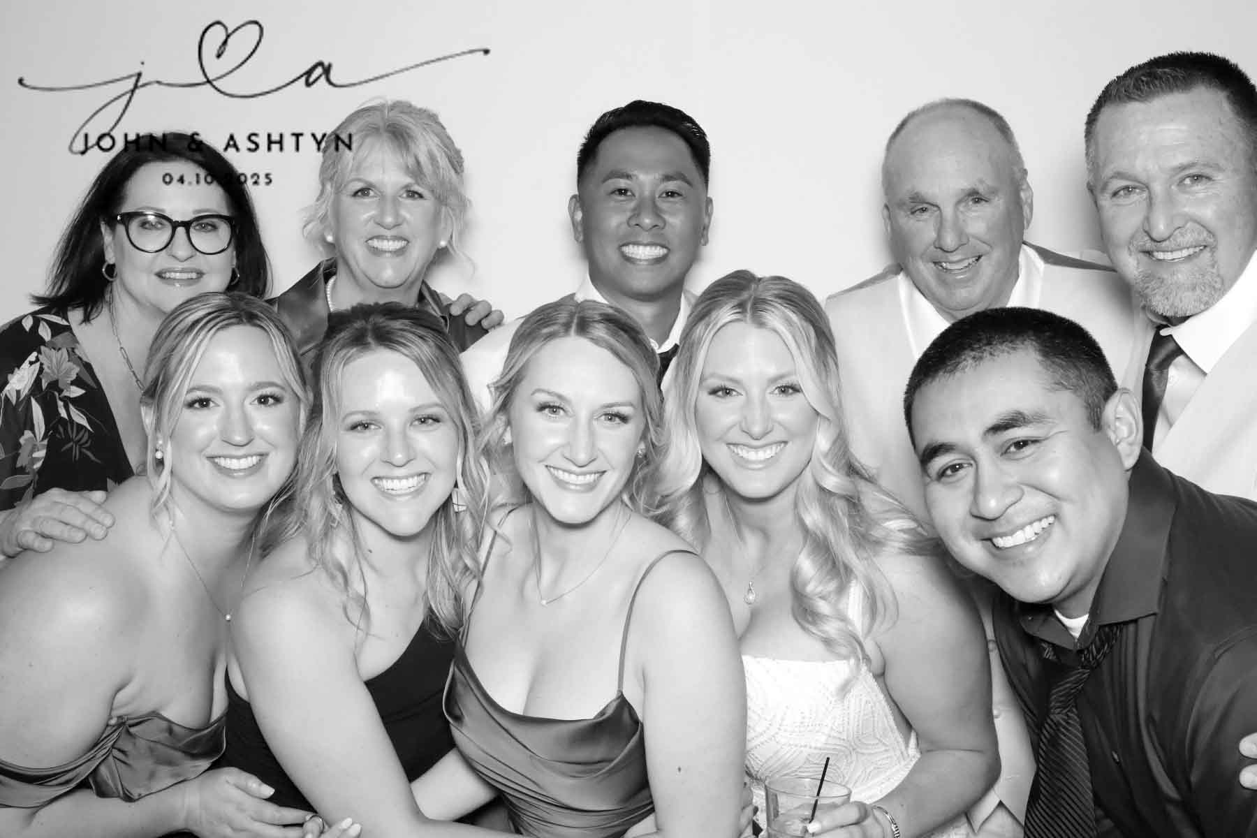 Guests posing with the bride and groom